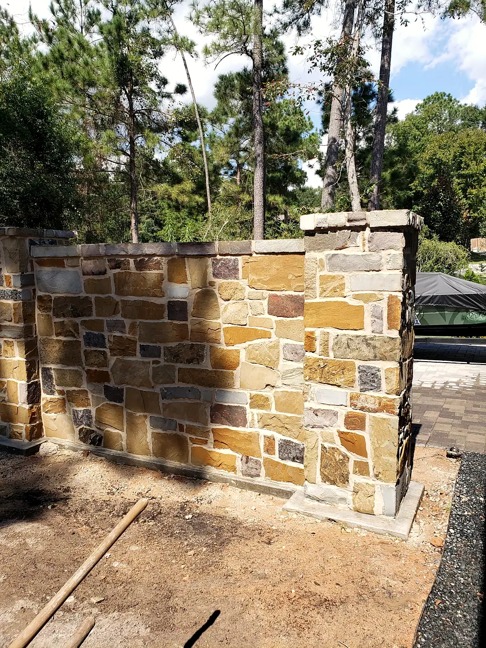 Close look at a mixed-color fieldstone wall